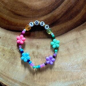 Taylor Swift Handmade Friendship Beaded Bracelet
“Truth Dare Spin Bottles”